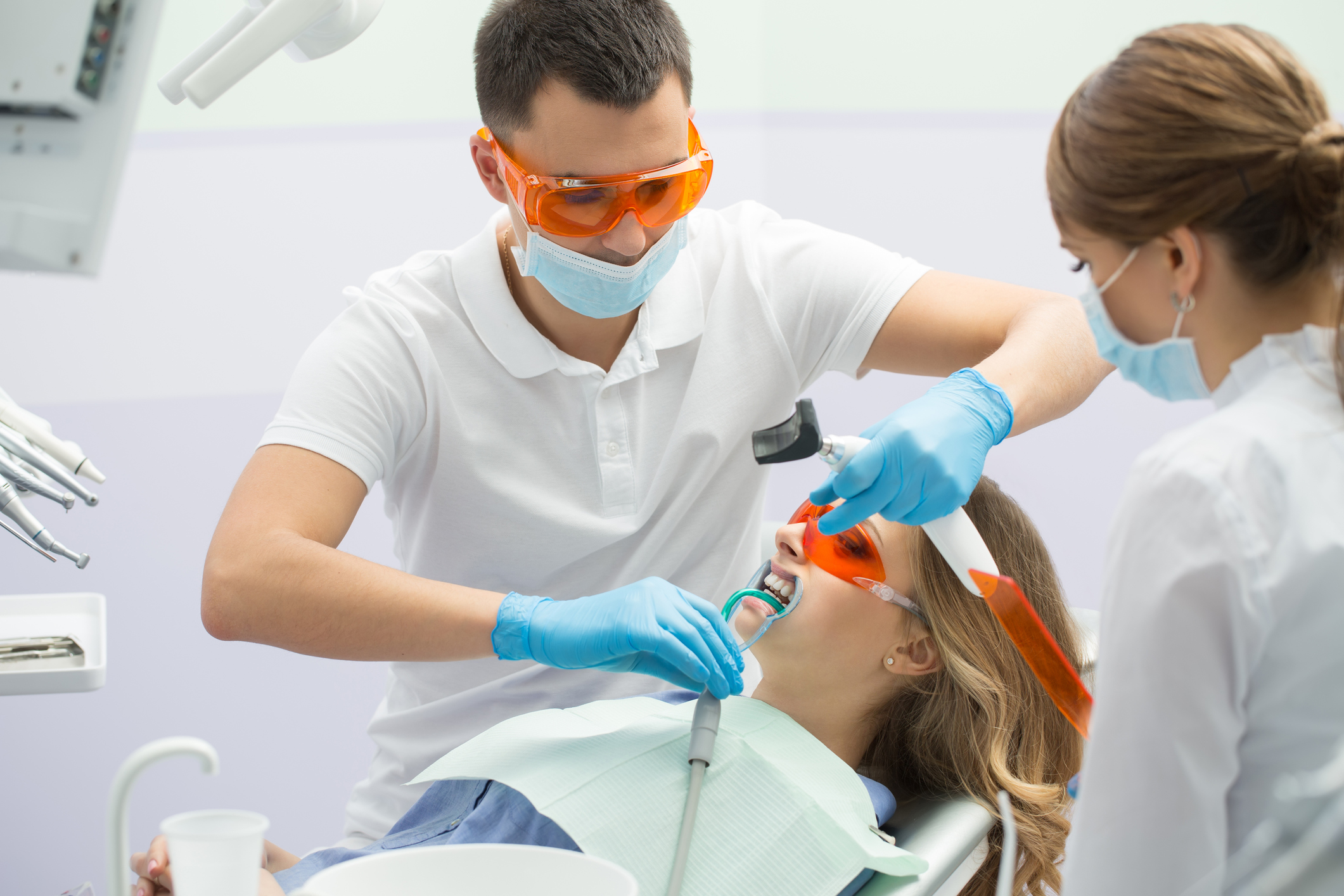 Dentist treating patient